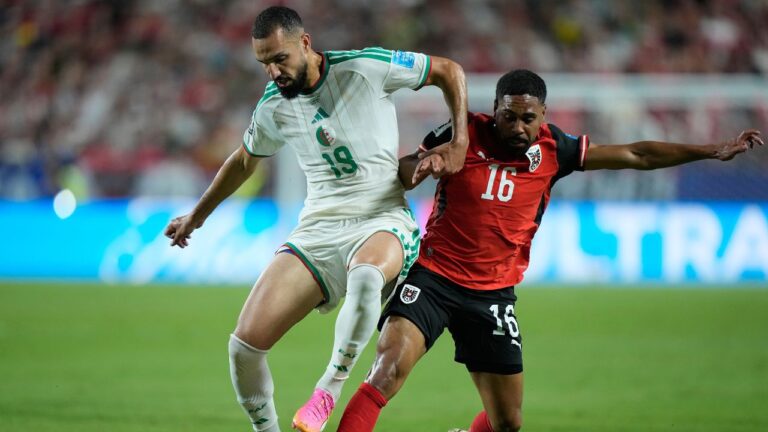 Austria and Algeria draw at World Cup to advance to knockout round