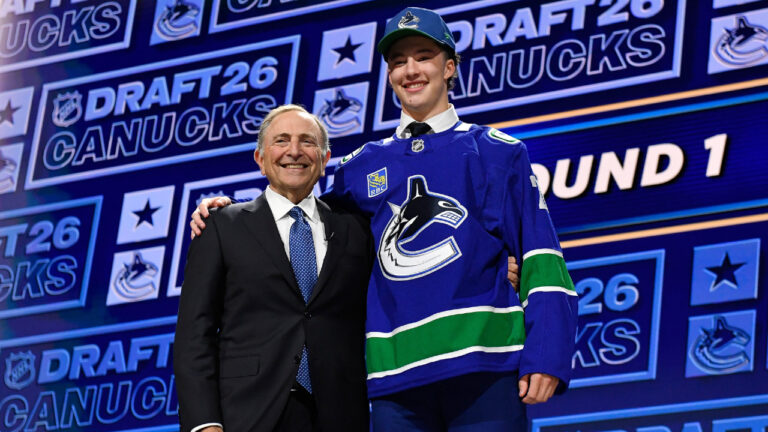 Canucks ignore convention by pairing coach Malhotra with son Caleb