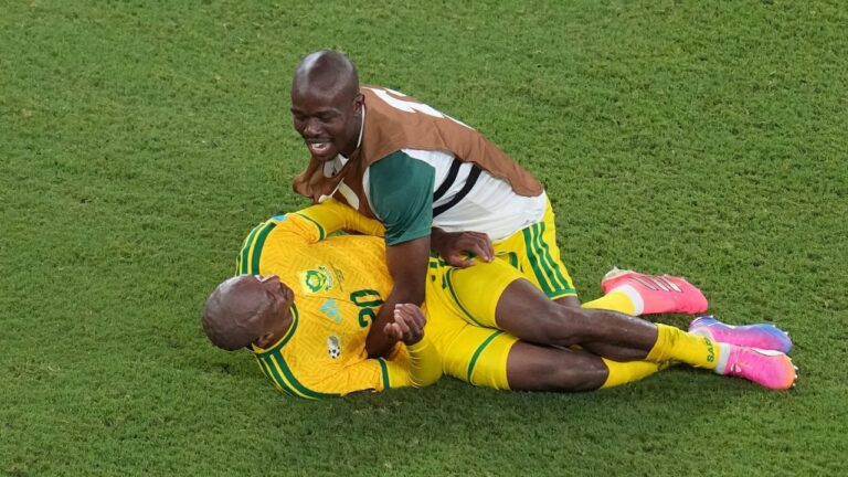 South Africa reaches World Cup knockout round for first time with win