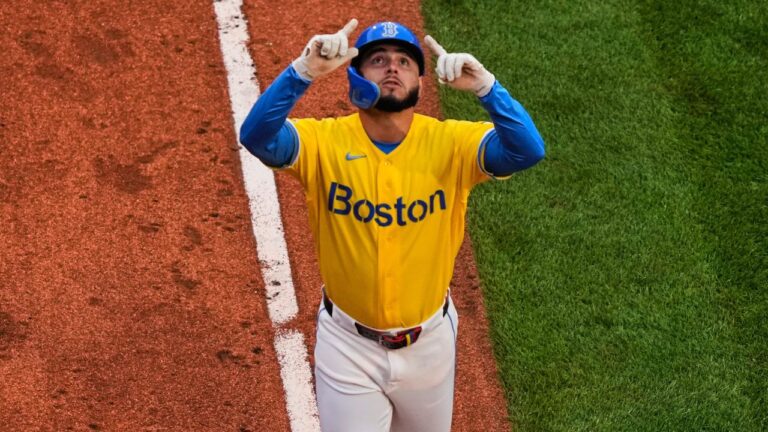 Abreu homers twice as Red Sox edge Rays for 12th straight win