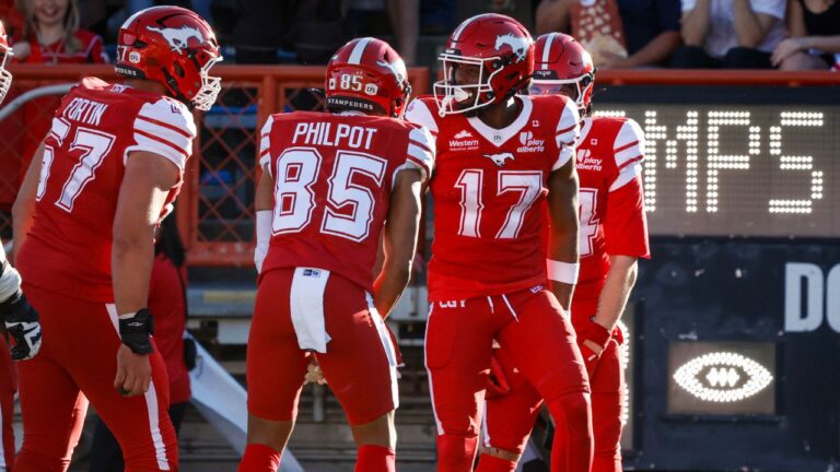 Adams throws six touchdown passes, rushes for one in Stampeders’ win over Argos