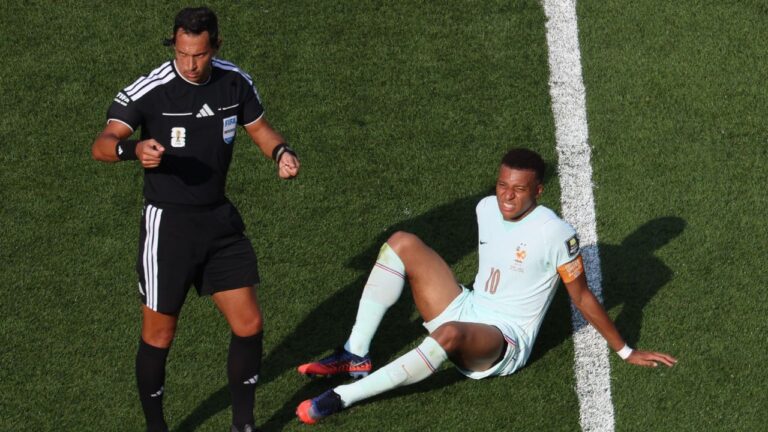 Kylian Mbappé scores eighth World Cup goal before leaving with ‘slight’ ankle injury