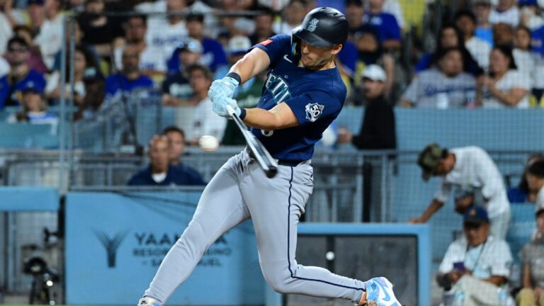Mariners out slug Dodgers to win opener