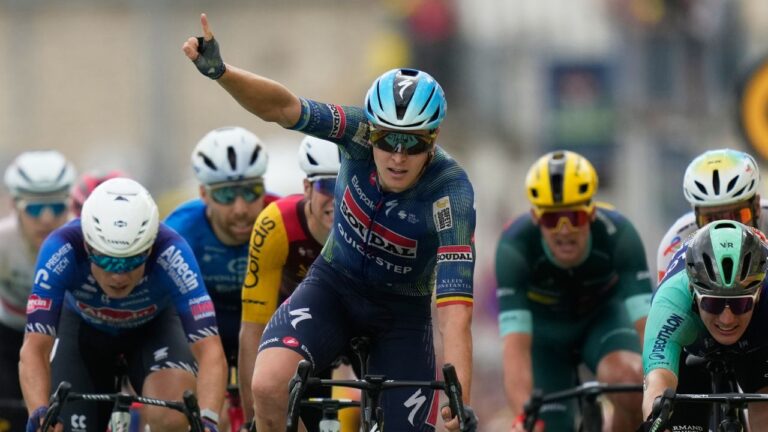 Merlier wins 12th stage of Tour de France, Pogacar retains overall lead